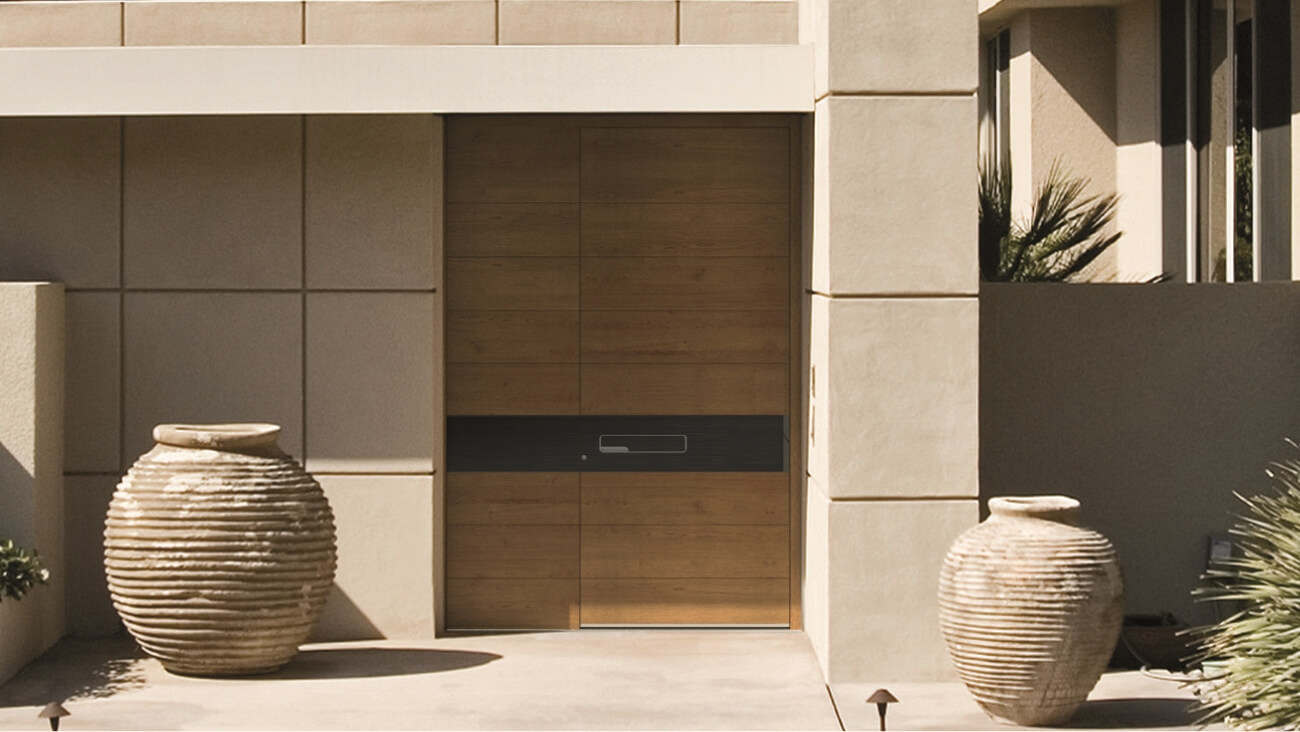 Portes d'entrée en bois ou aluminium